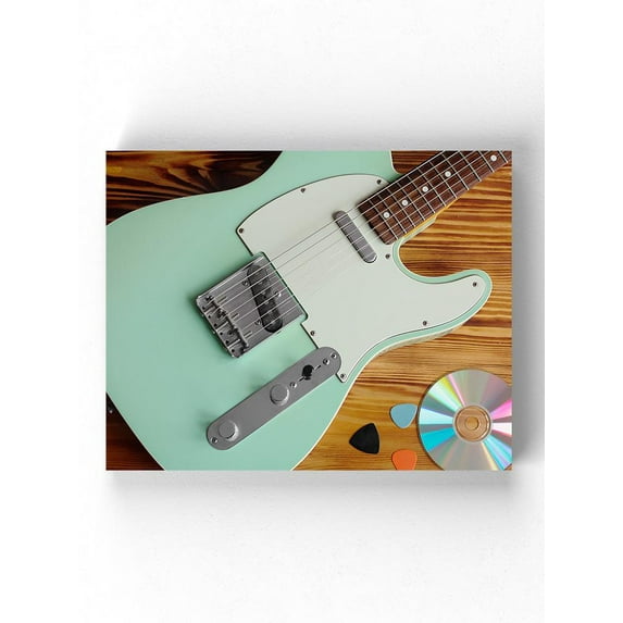 Electric Guitar Picks And Disk Wrapped Canvas -Image by Shutterstock,