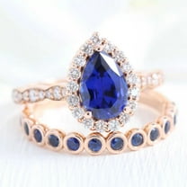 Elegant Pear and Round Cut Lab-Created Blue Sapphire and Moissanite Wedding Ring Set in 925 Sterling Silver for Women - Symbol of Love, Durable, Hypoallergenic, Perfect Gift