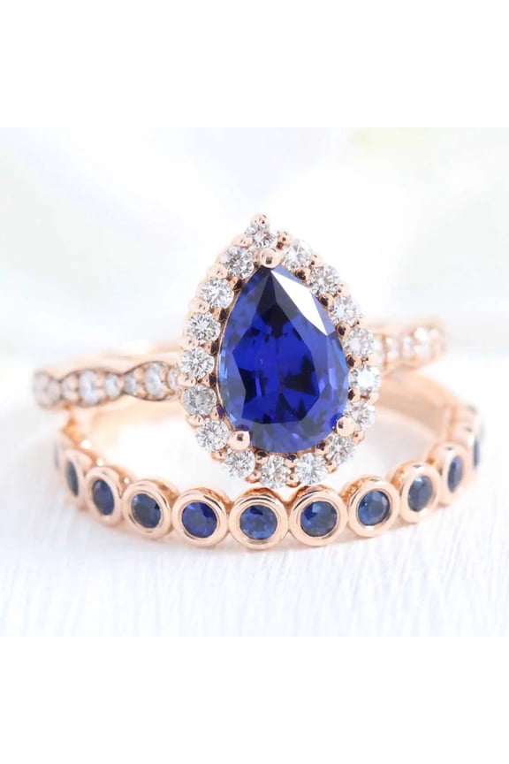 Elegant Pear and Round Cut Lab-Created Blue Sapphire and Moissanite Wedding Ring Set in 925 Sterling Silver for Women - Symbol of Love, Durable, Hypoallergenic, Perfect Gift