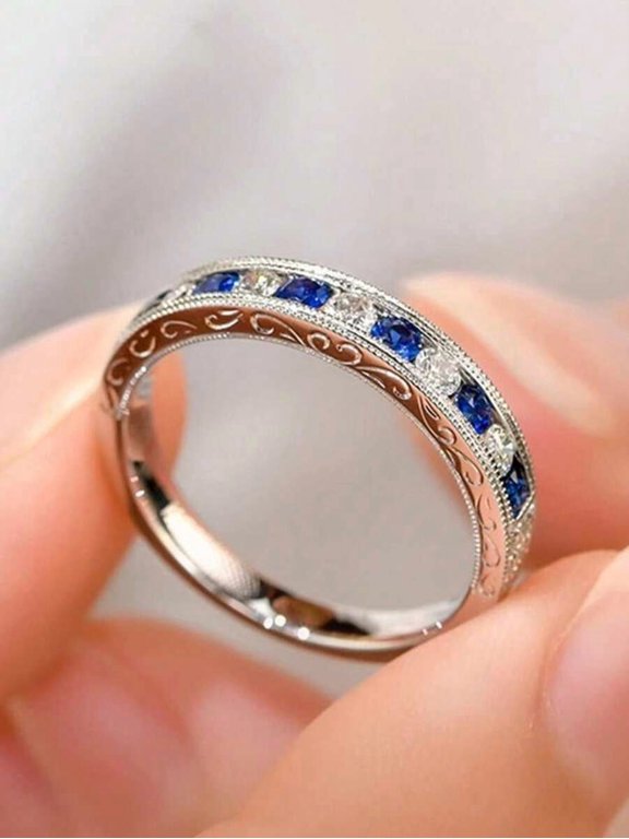 Elegant Sapphire and Cubic Zirconia Eternity Band Ring in Silver
