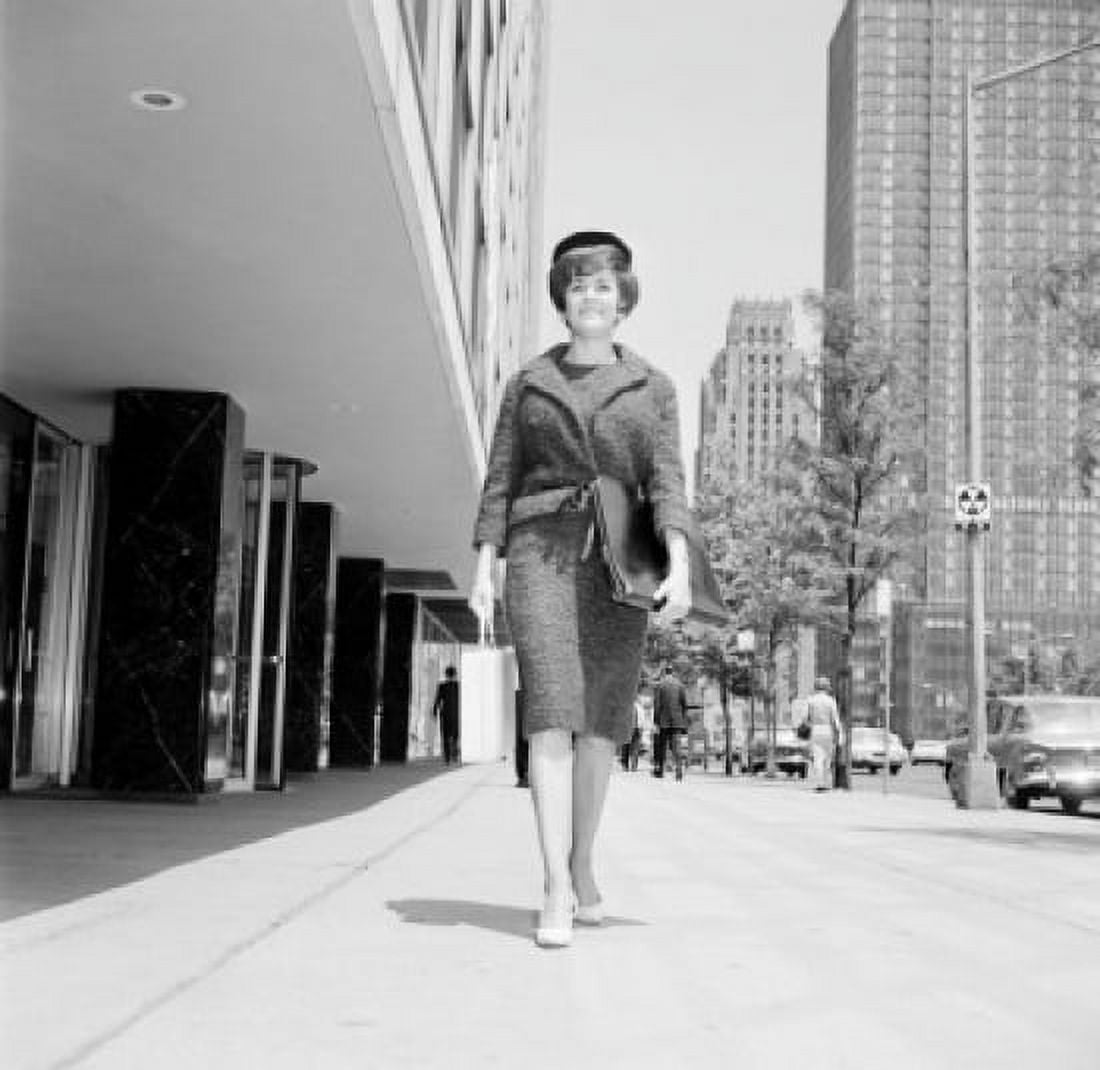 Elegant woman on street Canvas Art - (24 x 36)