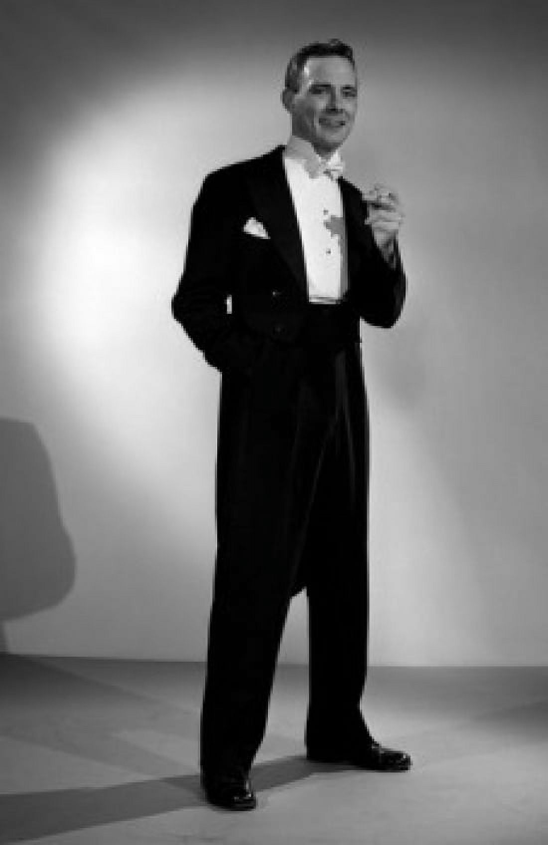 Elegant young man holding cigarette Canvas Art - (24 x 36)