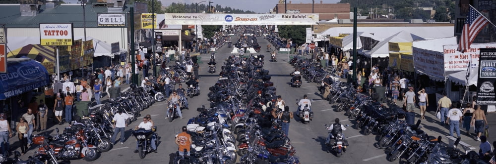 Elevated panoramic view of Main Street with motorcycles lining road at the 67th Annual Sturgis Motorcycle Rally Sturgis South Dakota August 6-12 2007 Canvas Art - Panoramic Images (27 x 9)