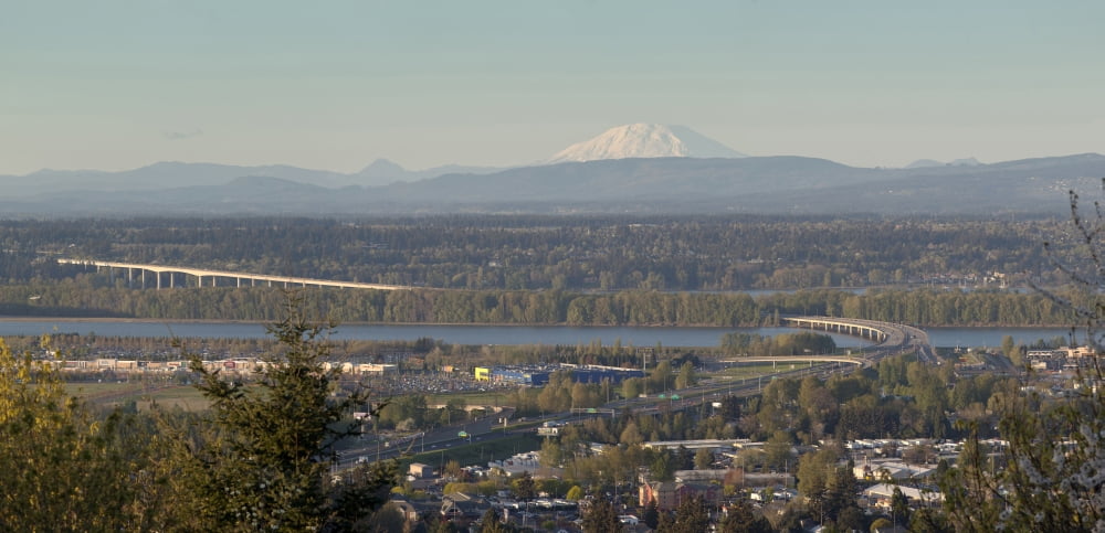 Elevated view of Interstate 205 Bridge over Columbia River with Mount St Helens and business plaza Portland Oregon USA Canvas Art - Panoramic Images (36 x 12)