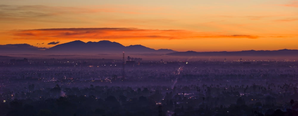 Elevated view of buildings in city East Los Angeles San Bernardino Mountains Los Angeles County California USA Canvas Art - Panoramic Images (36 x 12)