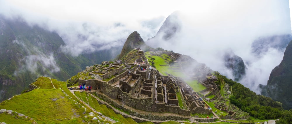 Elevated view of Machu Picchu Machupicchu District Urubamba Province Cusco Region Peru Canvas Art - Panoramic Images (22 x 9)