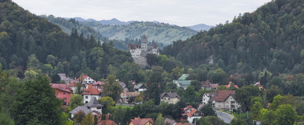 Elevated view of a town Bran Castle Bran Brasov County Transylvania Romania Canvas Art - Panoramic Images (36 x 12)