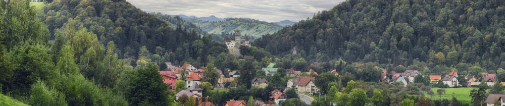 Elevated view of a town Bran Castle Bran Brasov County Transylvania Romania Canvas Art - Panoramic Images (36 x 12)