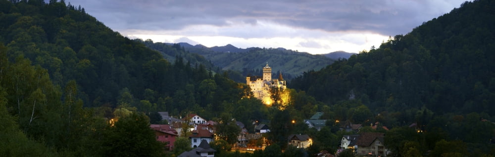 Elevated view of a town Bran Castle Bran Brasov County Transylvania Romania Canvas Art - Panoramic Images (36 x 12)