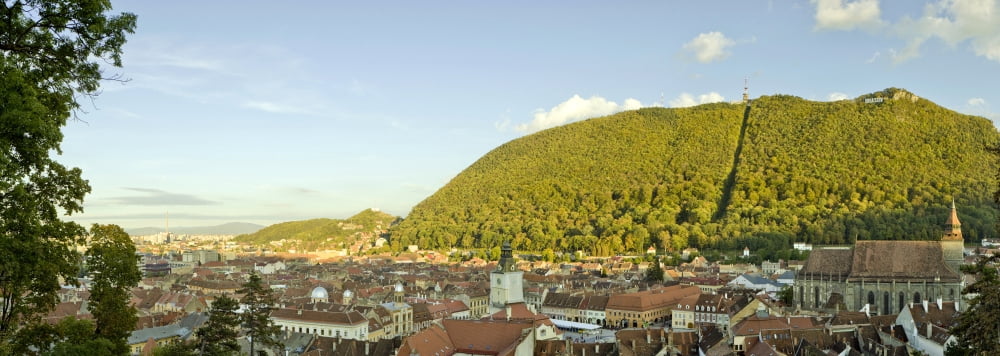 Elevated view of a town Brasov Brasov County Transylvania Romania Canvas Art - Panoramic Images (27 x 9)