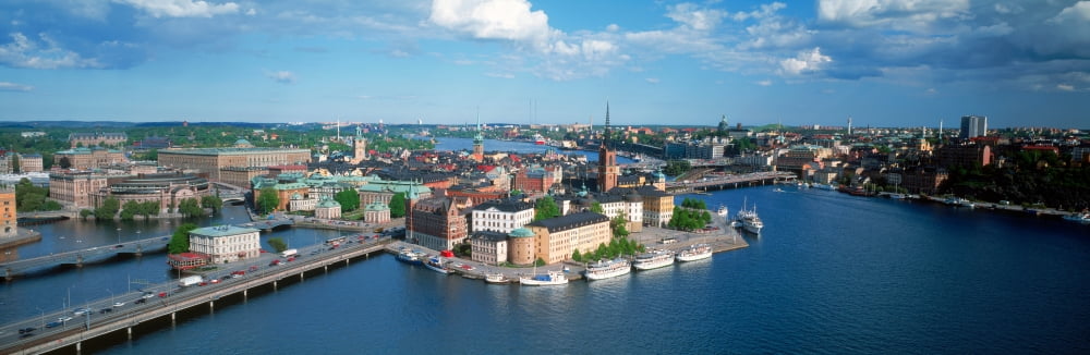 Elevated view of city at the waterfront Riddarholmen Riddarfjarden Lake Malaren Stockholm Sweden Canvas Art - Panoramic Images (6 x 18)