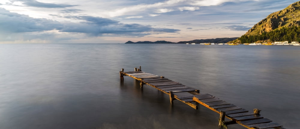Elevated view of jetty on beach Copacabana Lake Titicaca Bolivia Canvas Art - Panoramic Images (27 x 9)