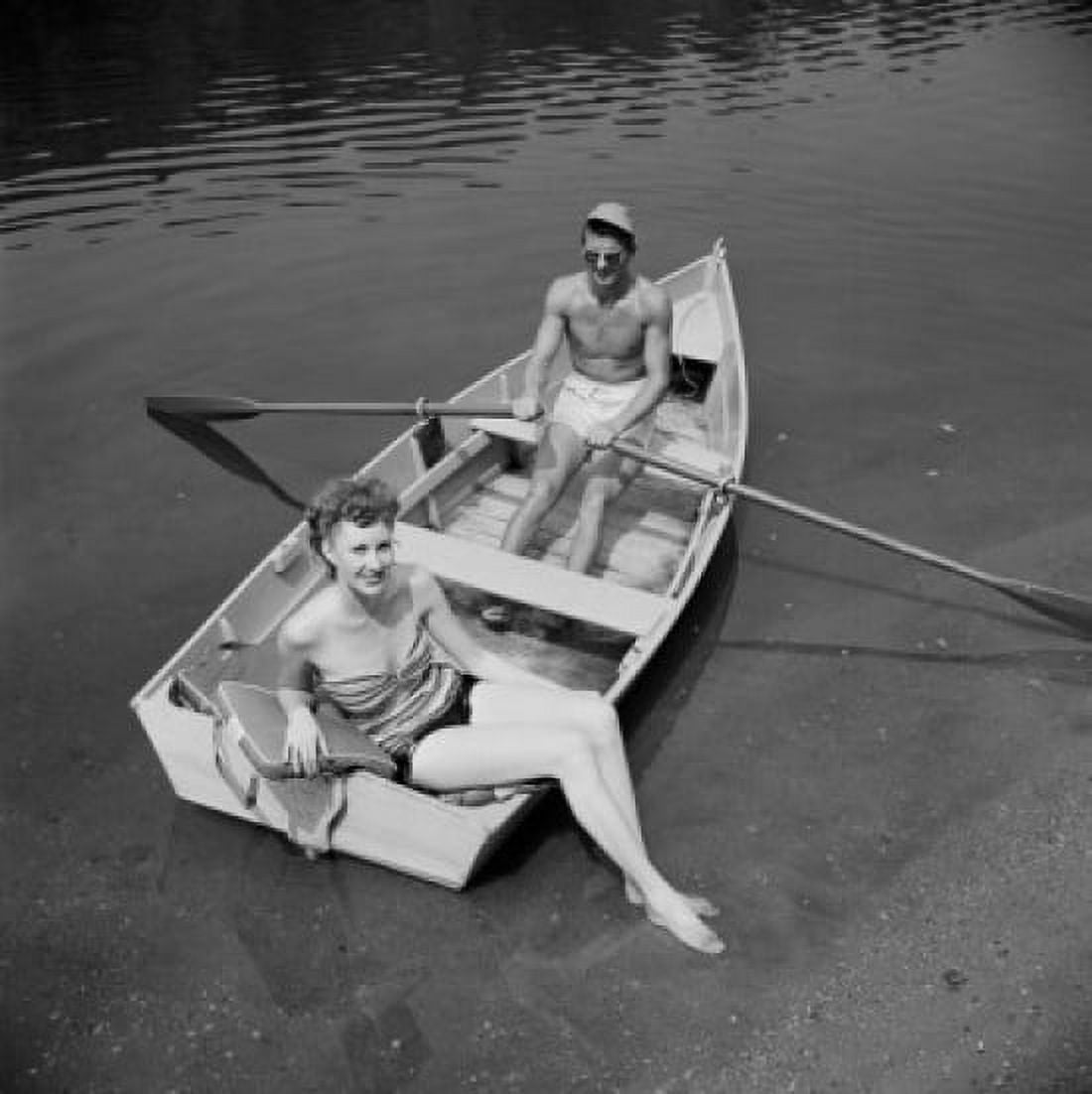 Elevated view of man and woman in fishing boat Canvas Art - (24 x 36)