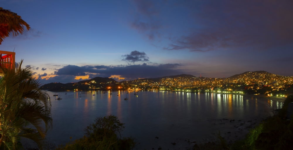 Elevated view of the Playa La Madera at dusk Zihuatanejo Guerrero Mexico Canvas Art - Panoramic Images (36 x 12)