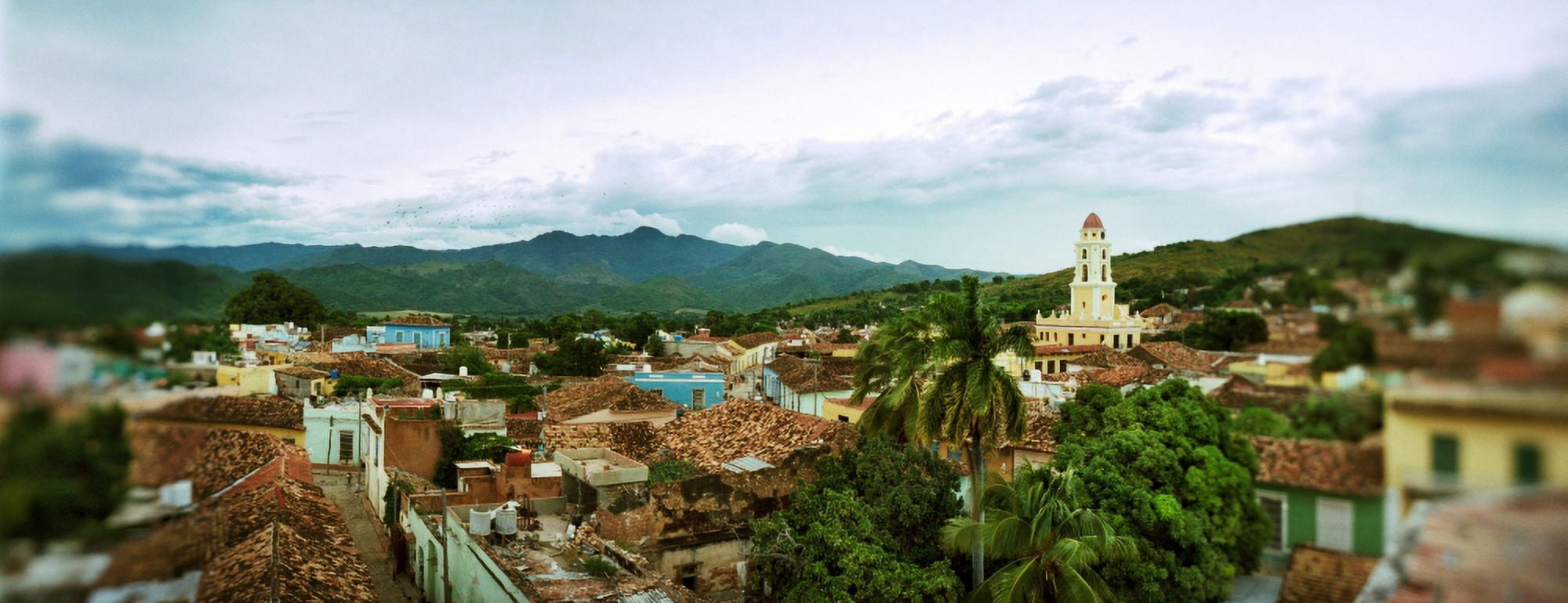 Elevated view of townscape against cloudy sky Trinidad Sancti Spiritus Cuba Canvas Art - Panoramic Images (12 x 30)