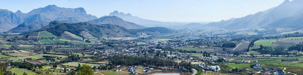 Elevated view of a valley with mountain range in the background Franschhoek Valley Boland Wine Country South Africa Canvas Art - Panoramic Images (10 x 40)