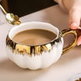 thumbnail image 1 of Eliaeconx Ceramic Pumpkin Mug with Lid, 16 Oz Halloween Coffee Cup, Cute Pumpkin Shaped Tea Mug with Spoon, for Office, Home, Holiday Drinks, White, 1 of 6