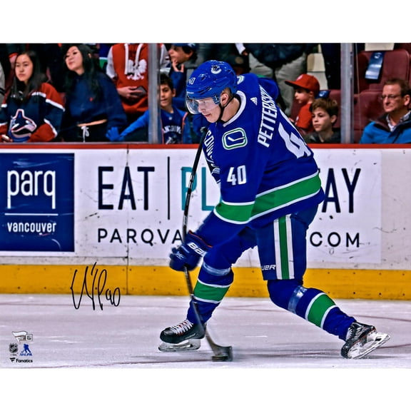Elias Pettersson Vancouver Canucks Autographed 16" x 20" Blue Jersey Shooting Photograph - Fanatics Authentic Certified