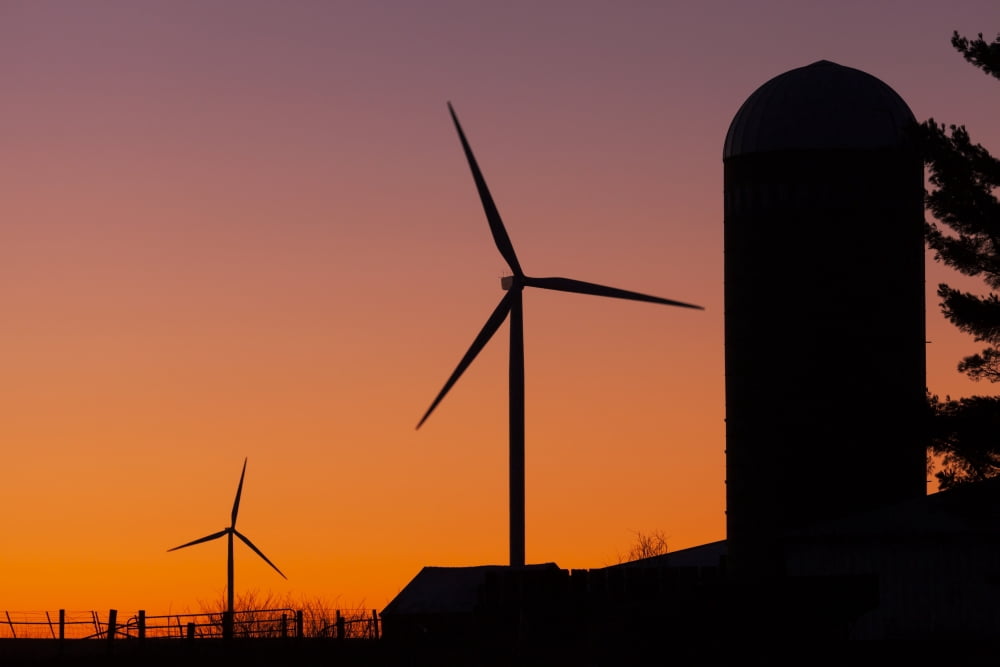 Elk Wind Energy Farm and a silo at sunrise near Edgewood Iowa United States of America Canvas Art - Lucas Payne Design Pics (19 x 12)
