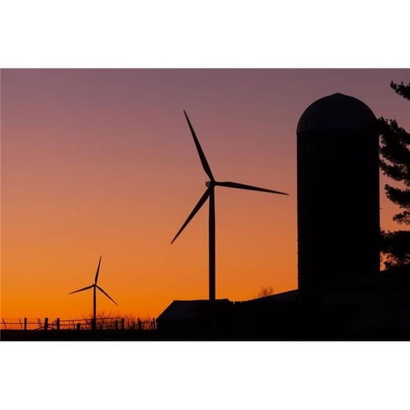 Elk Wind Energy Farm and a silo at sunrise near Edgewood; Iowa United States of America Poster Print