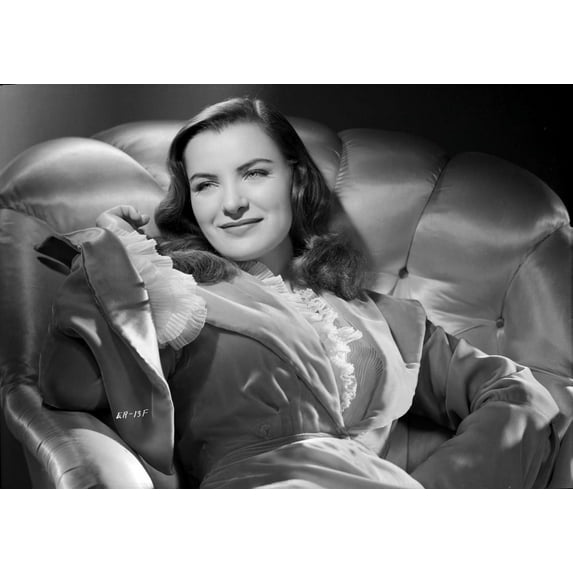 Ella Raines Seated in Robe Photo Print (24 x 30)