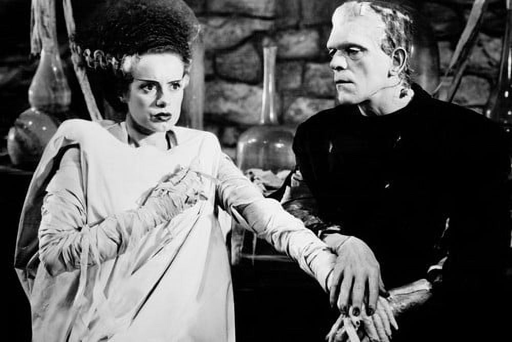 Elsa Lanchester and Boris Karloff in Bride of Frankenstein holding ...