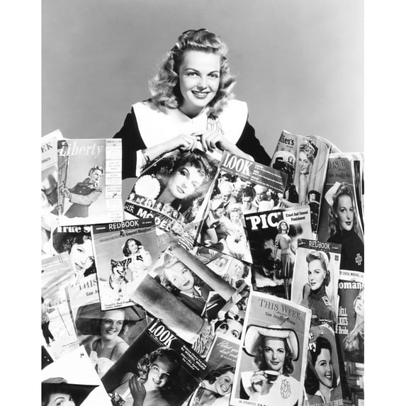 Elyse Knox Posing Amid All Of The Magazines Which Feature Her Picture On The Cover 1943 Photo Print