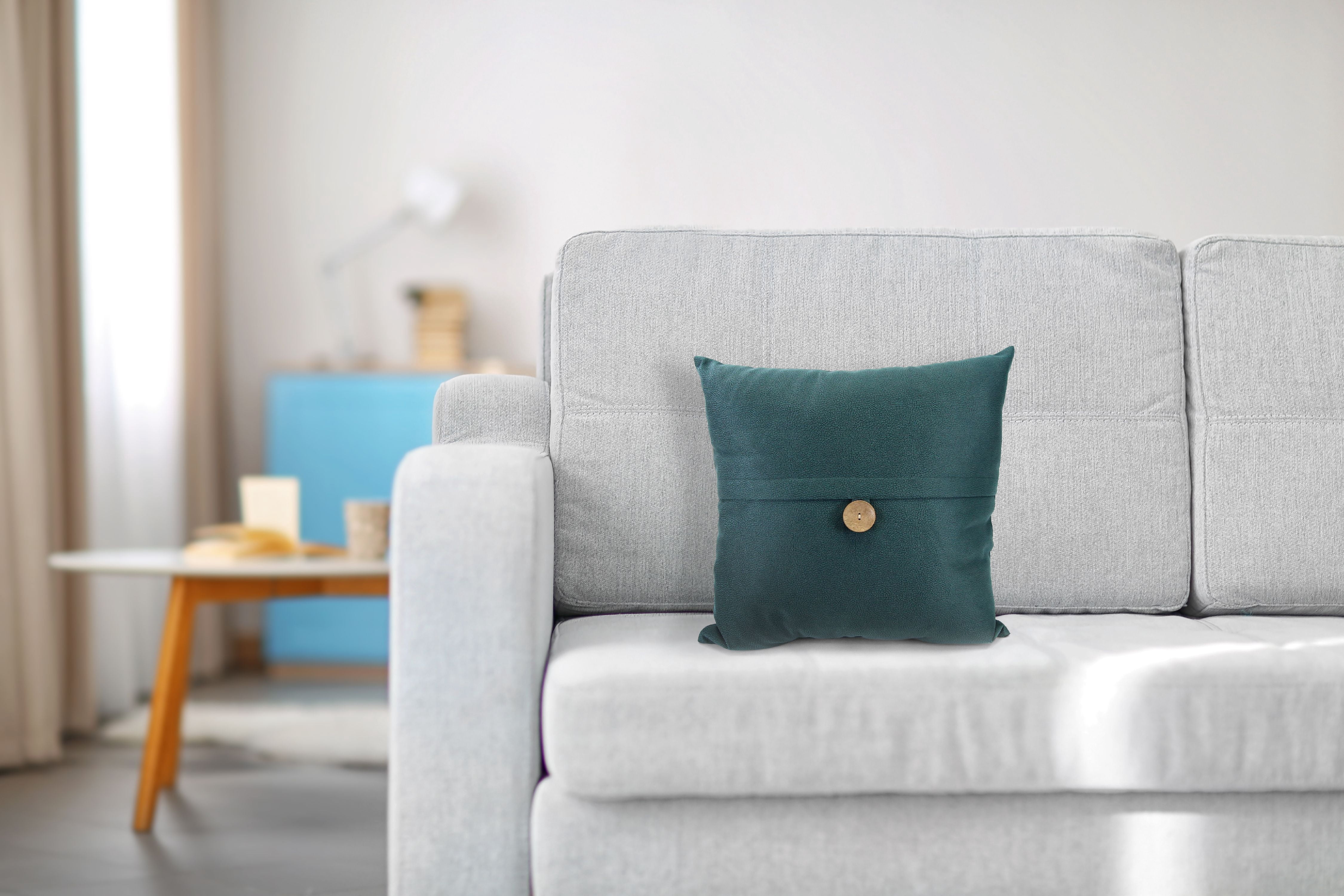 Embossed Suede 20x20 Teal Throw Pillow with Button