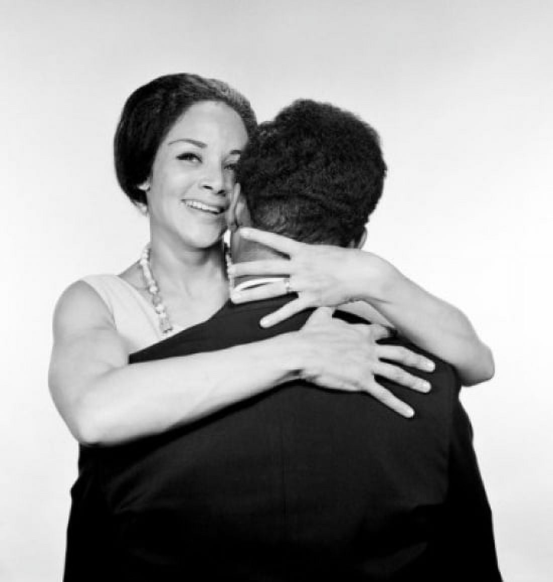 Embracing African-american married couple studio shot Canvas Art - (18 x 24)