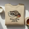 thumbnail image 1 of Embroidered Raccoon Sweatshirt, Doing Nothing Perfectly Crewneck, Funny Animal Lover Gift, Sarcastic Raccoon Shirt, Lazy Day Apparel, 1 of 4