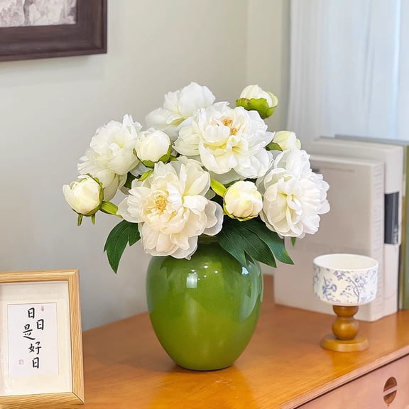 Emerald green ceramic vase, 16*16*24cm, round bottle body.