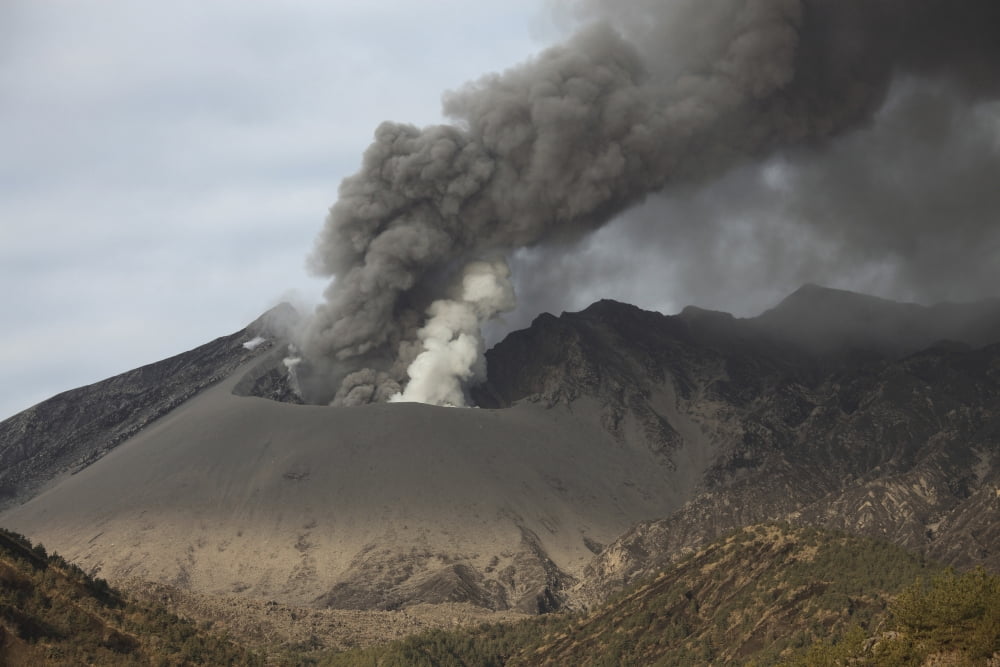 Emission of ash from Sakurajima volcano Japan Canvas Art - Richard RoscoeStocktrek Images (35 x 23)