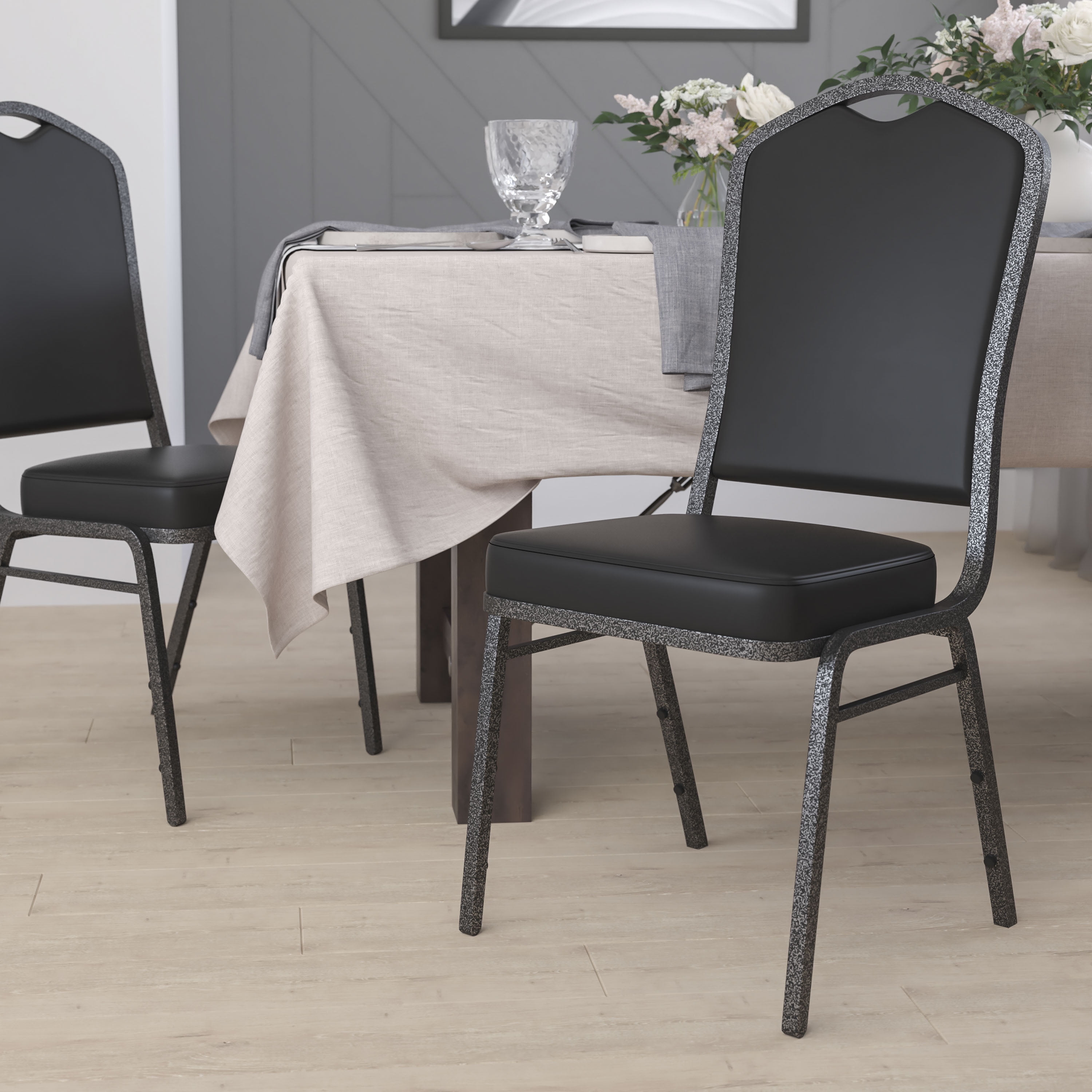 emma-oliver-crown-back-stacking-banquet-chair-black-vinyl-silver