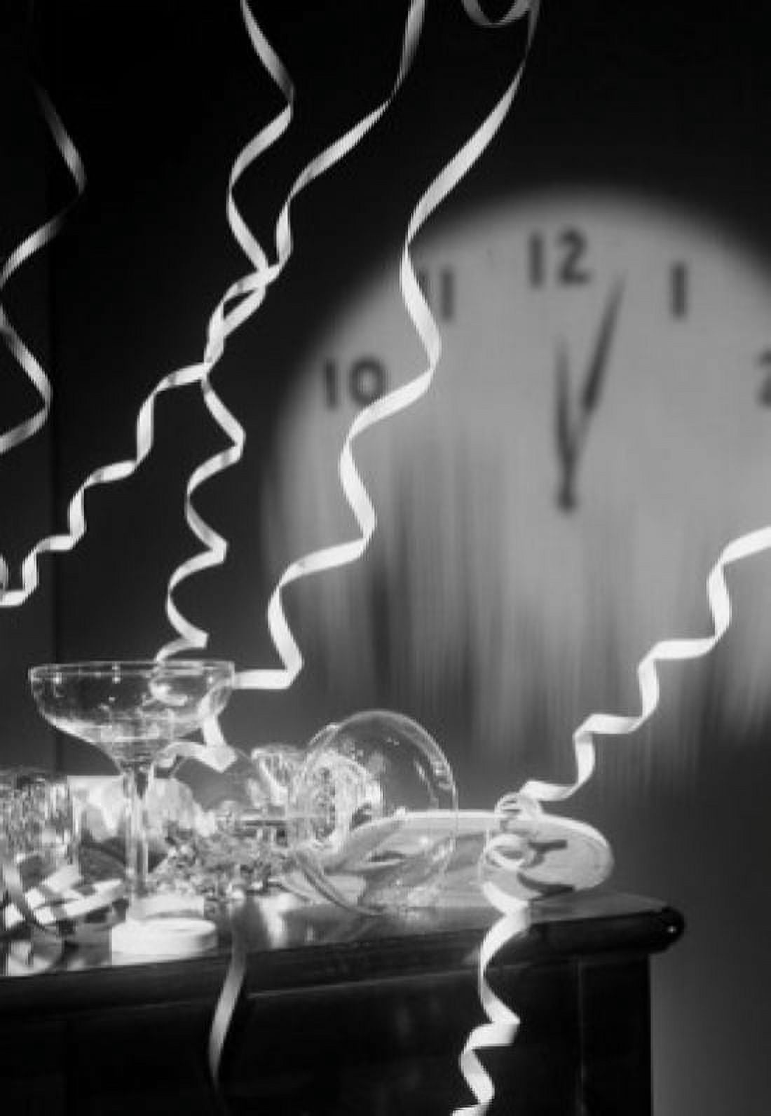 Empty champagne flutes with streamers and clock face showing five past midnight Canvas Art - (24 x 36)