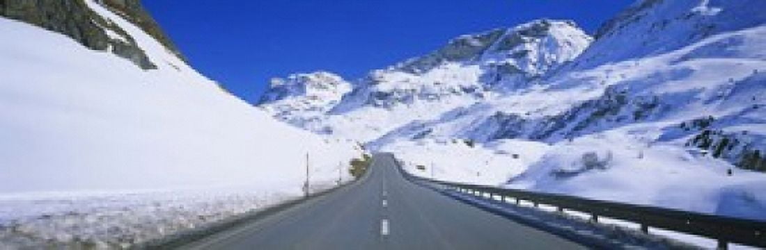 Empty road passing through a polar landscape Route 3 Graubunden Switzerland Canvas Art - Panoramic Images (18 x 6)