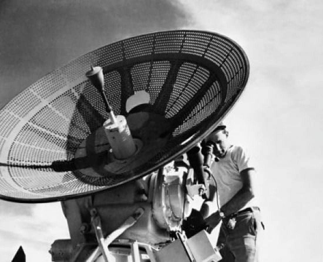 Engineer operating a radar antenna Canvas Art - (18 x 24)