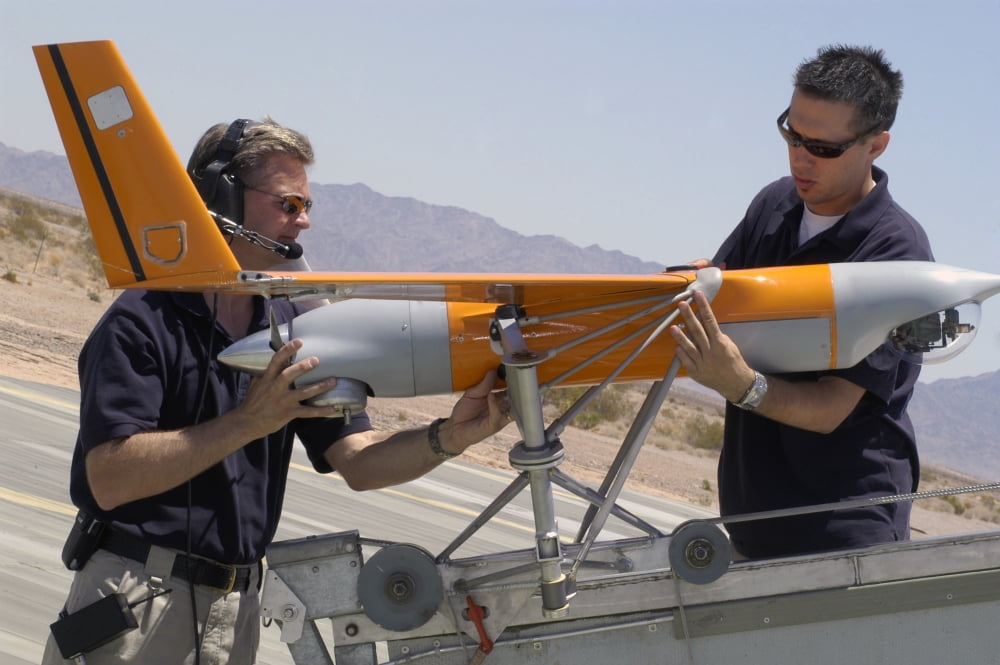 Engineers mount a ScanEagle unmanned aerial vehicle on a catapult launcher Canvas Art - Stocktrek Images (35 x 23)