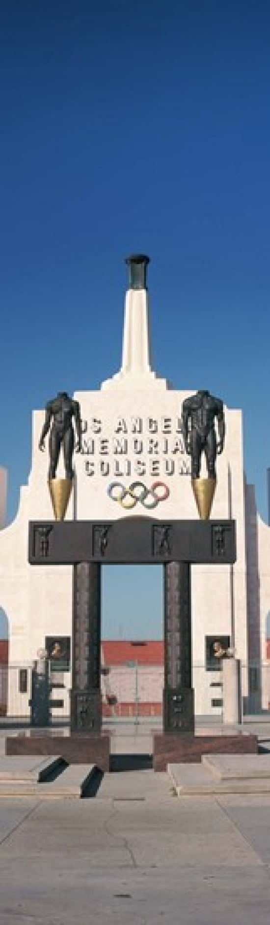 Entrance of a stadium Los Angeles Memorial Coliseum Los Angeles California USA Canvas Art - Panoramic Images (38 x 12)