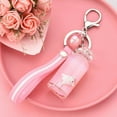 thumbnail image 1 of Epicgadget Keychain, Floating Milky Surfing Pig Bottle Key Chain Piglet Ornament for keys, handbag, bookbag, gift, decoration, 1 of 4