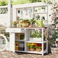thumbnail image 1 of Ergonomic Potting Bench Table with Hutch, Wooden Gardening Workstation featuring 5 Shelves, 1 Drawer, 1 Bottom Cabinet & 7 Hooks for Patio & Garden Storage, White, 1 of 9