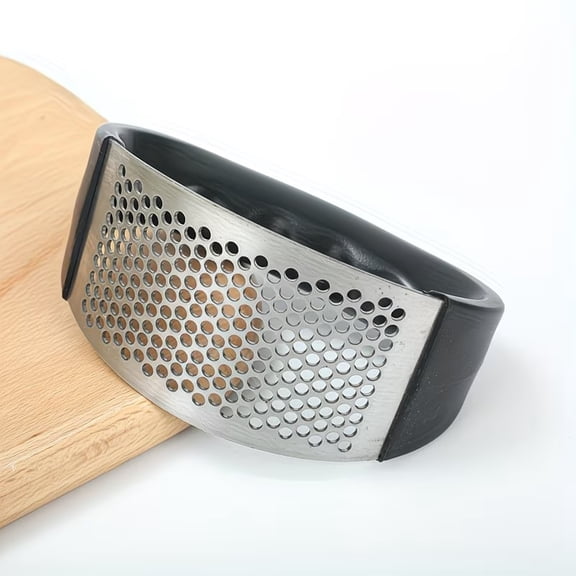Ergonomic Stainless Steel Garlic Crusher, Multifunctional Vegetable Chopper for Garlic, Ginger, Onions, and Soft Fruits Comfort Grip Kitchen Tool for Home Cooks and Professional Chefs