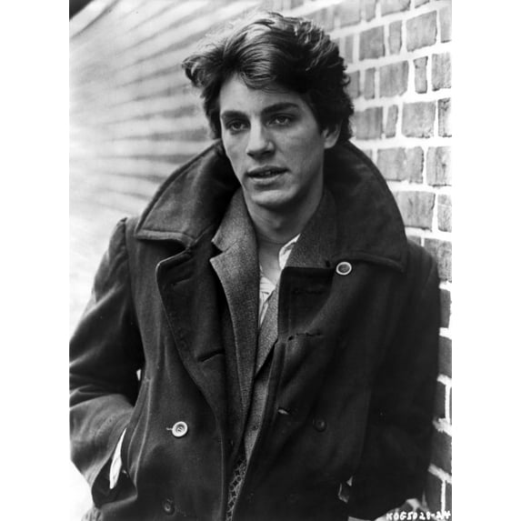 Eric Roberts wearing a coat in front of a brick wall Photo Print (24 x 30)