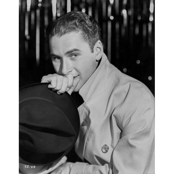 Errol Flynn Leaning on a Hat Pose Photo Print (8 x 10)