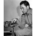 thumbnail image 1 of Errol Flynn Relaxes Between Scenes Of Objective Burma By Playing Chess History (18 x 24), 1 of 2
