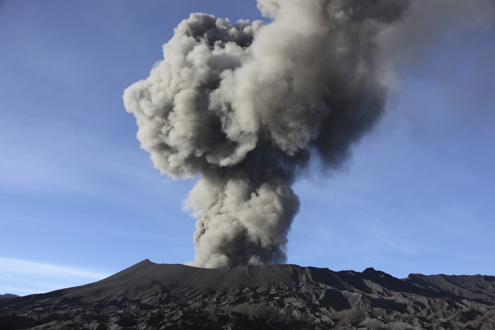 Eruption of ash cloud from Mount Bromo volcano Tengger Caldera Java Indonesia Canvas Art - Richard RoscoeStocktrek Images (18 x 12)