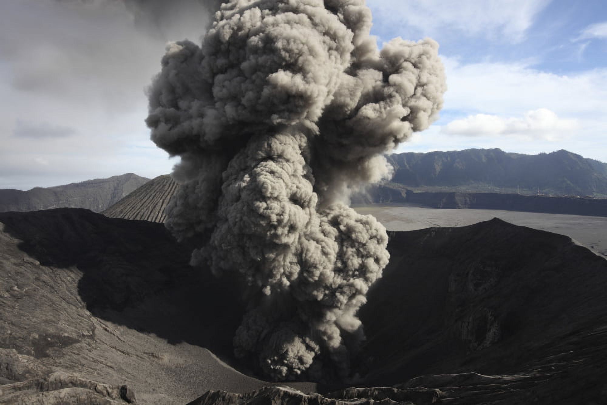 Eruption of ash cloud from crater of Mount Bromo Tengger Caldera Java Indonesia Canvas Art - Richard RoscoeStocktrek Images (35 x 23)