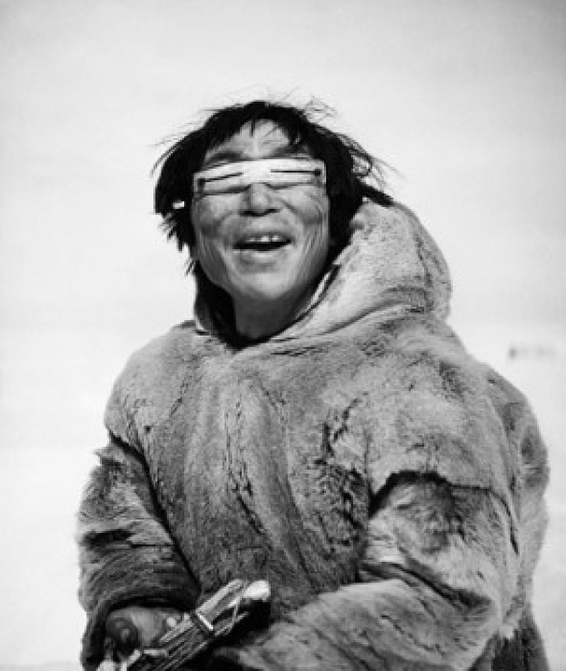 Eskimo man wearing wooden goggles and smiling Alaska USA Canvas Art - (24 x 36)
