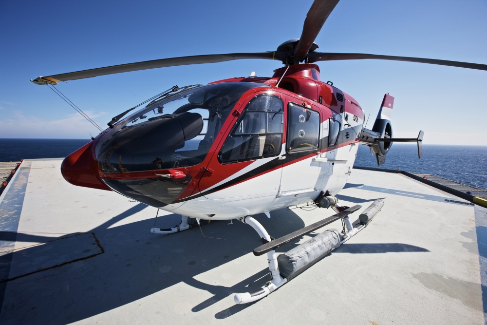 Eurocopter EC135 utility helicopter on the helipad of an oil rig Canvas Art - Terry MooreStocktrek Images (35 x 24)