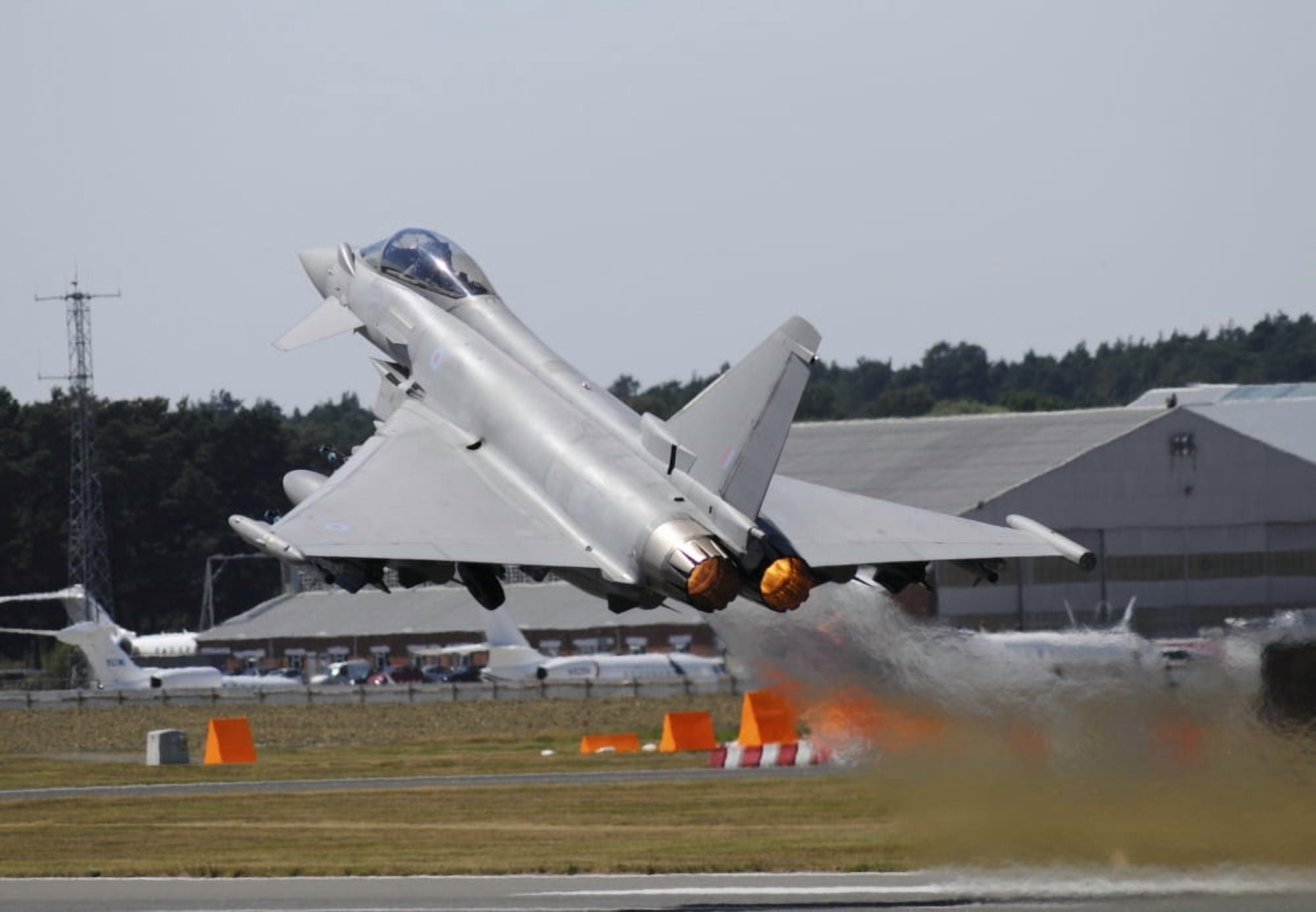 Eurofighter EF2000 Typhoon from the Royal Air Force at full afterburner during takeoff Canvas Art - Riccardo NiccoliStocktrek Images (34 x 24)