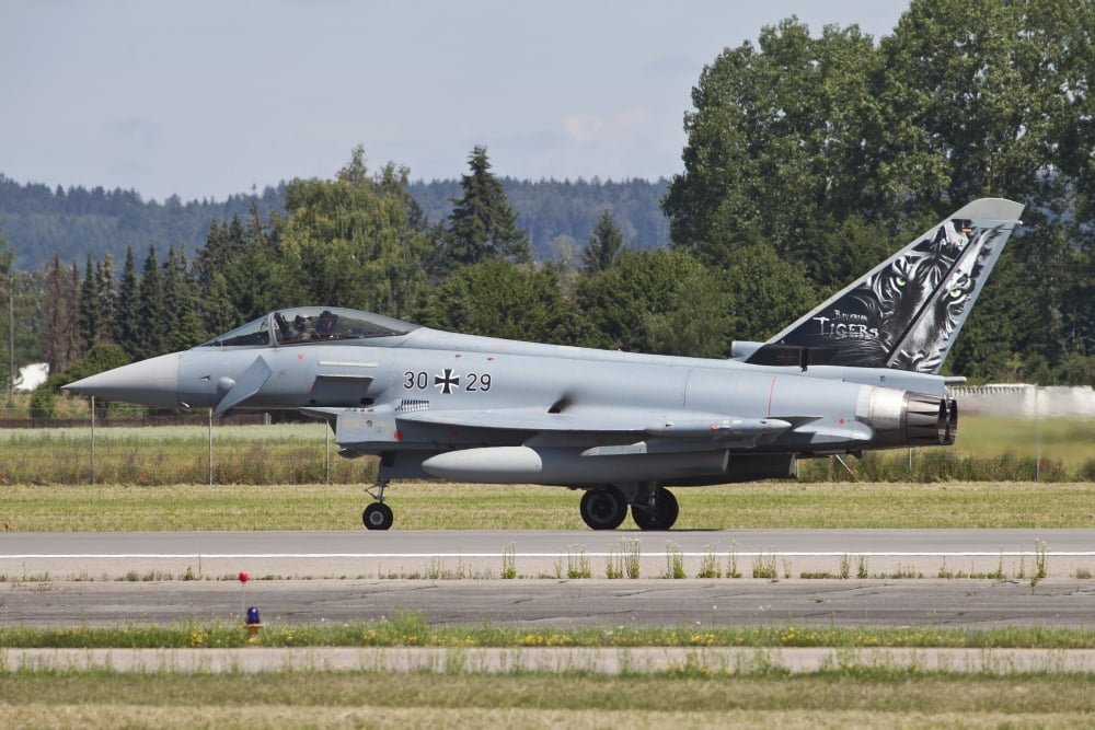 Eurofighter Typhoon of the German Air Force taxiing down the runway Canvas Art - Timm ZiegenthalerStocktrek Images (35 x 23)